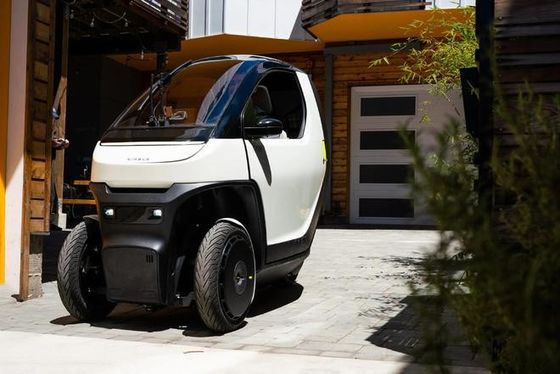 Mini ev car@ Nimbus One Eine kompakte, kippbare E-Fahrzeug mit Geschwindigkeiten von bis zu 50mph w/ Batterie Reichweite für den städtischen Pendeln